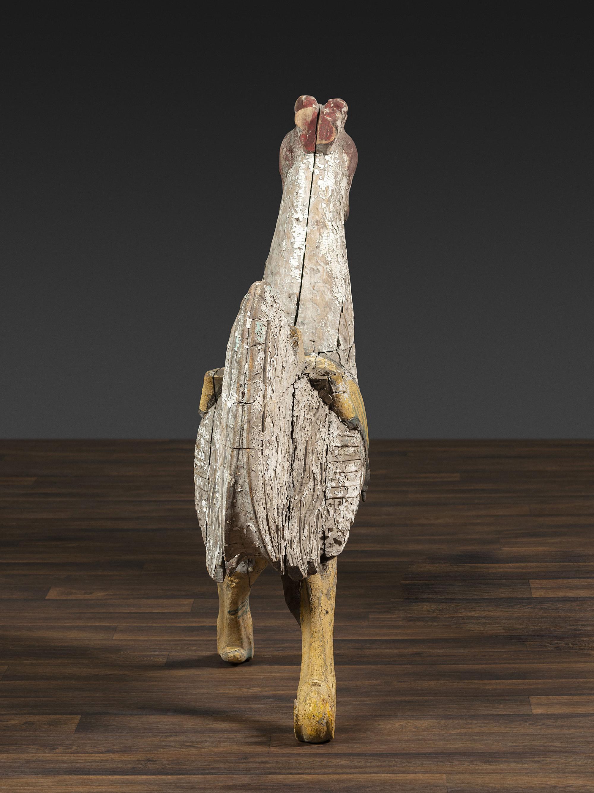 A Carved and Painted Wood Rooster Carousel Figure