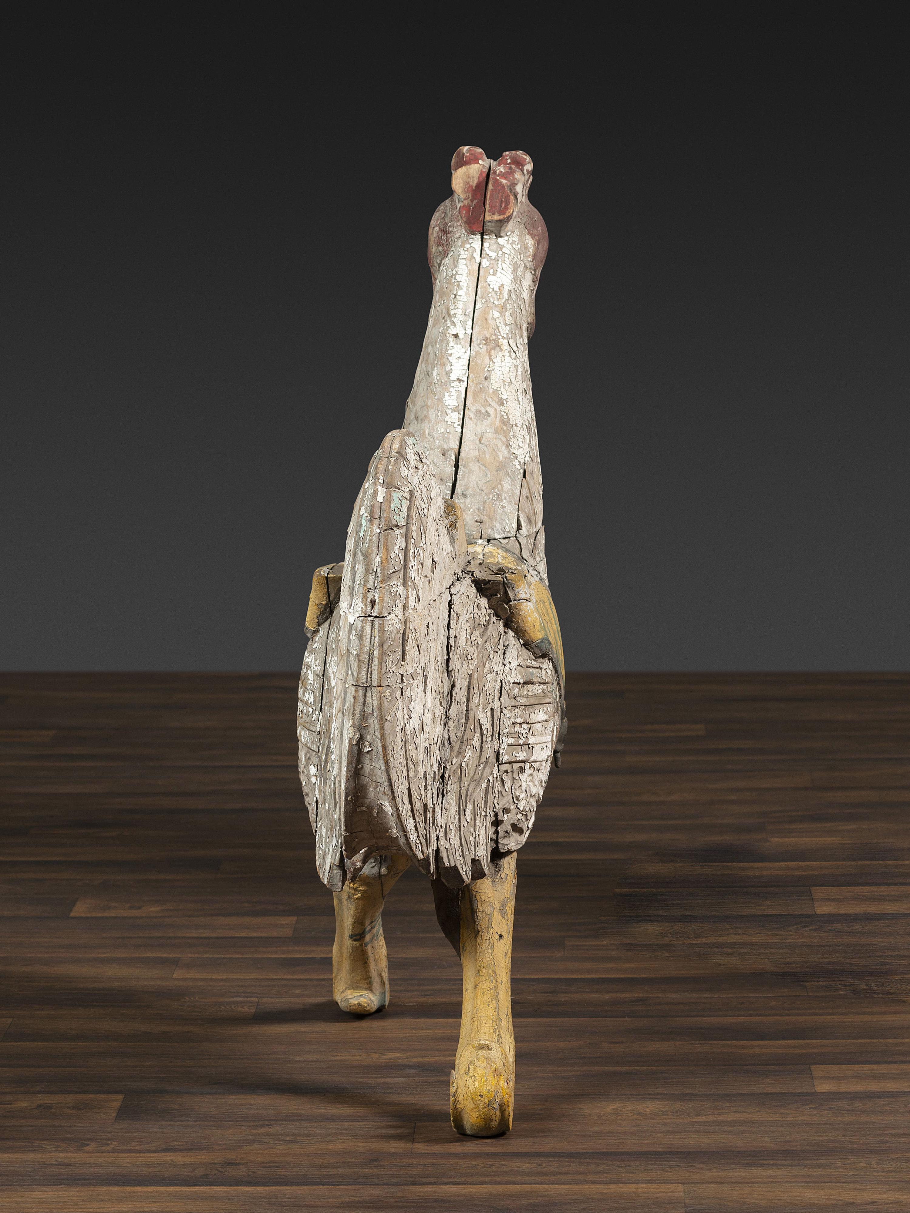 A Carved and Painted Wood Rooster Carousel Figure