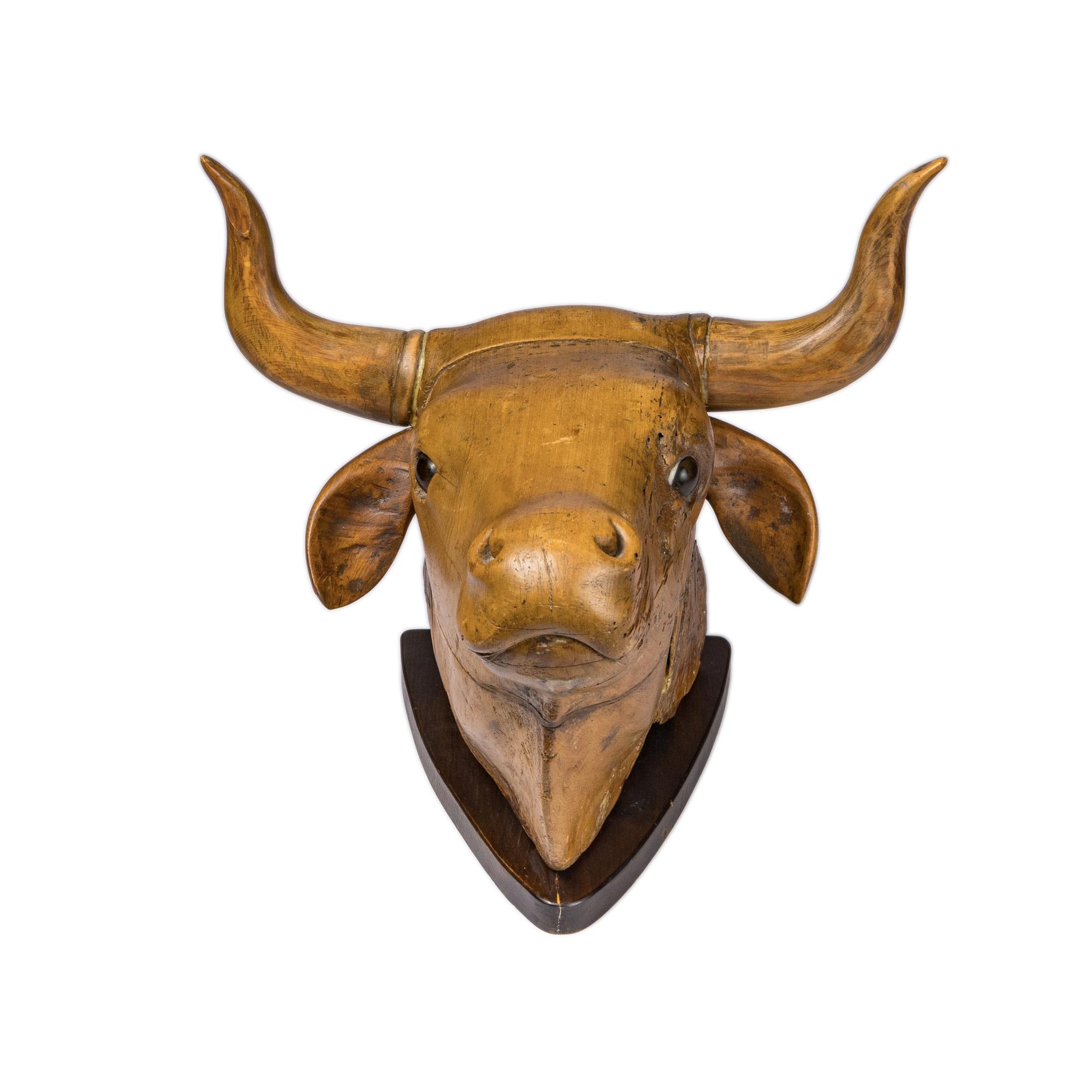A Carved Wood Bull's Head Mount