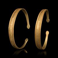 A Pair of Chinese Gold Bracelets, Qianzhuo, Liao Dynasty 遼 蛇首魚子地鏨花卉紋金鉗鐲一對
