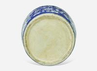 A very large Chinese blue ground white slip-decorated vase, mid 19th century 藍地白花貫耳瓶 十九世紀