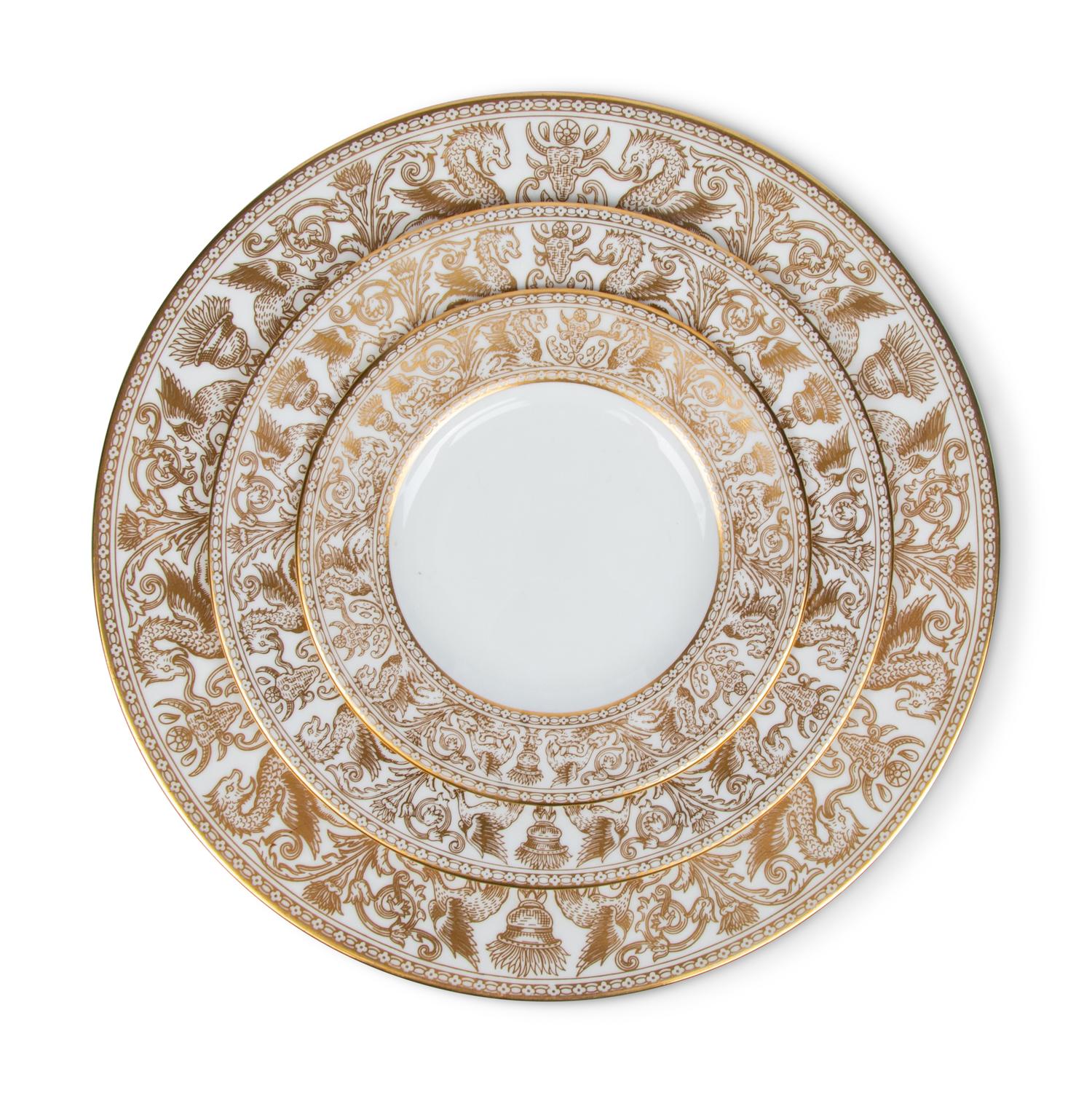 A Wedgwood Gold Florentine Porcelain Dinner Service