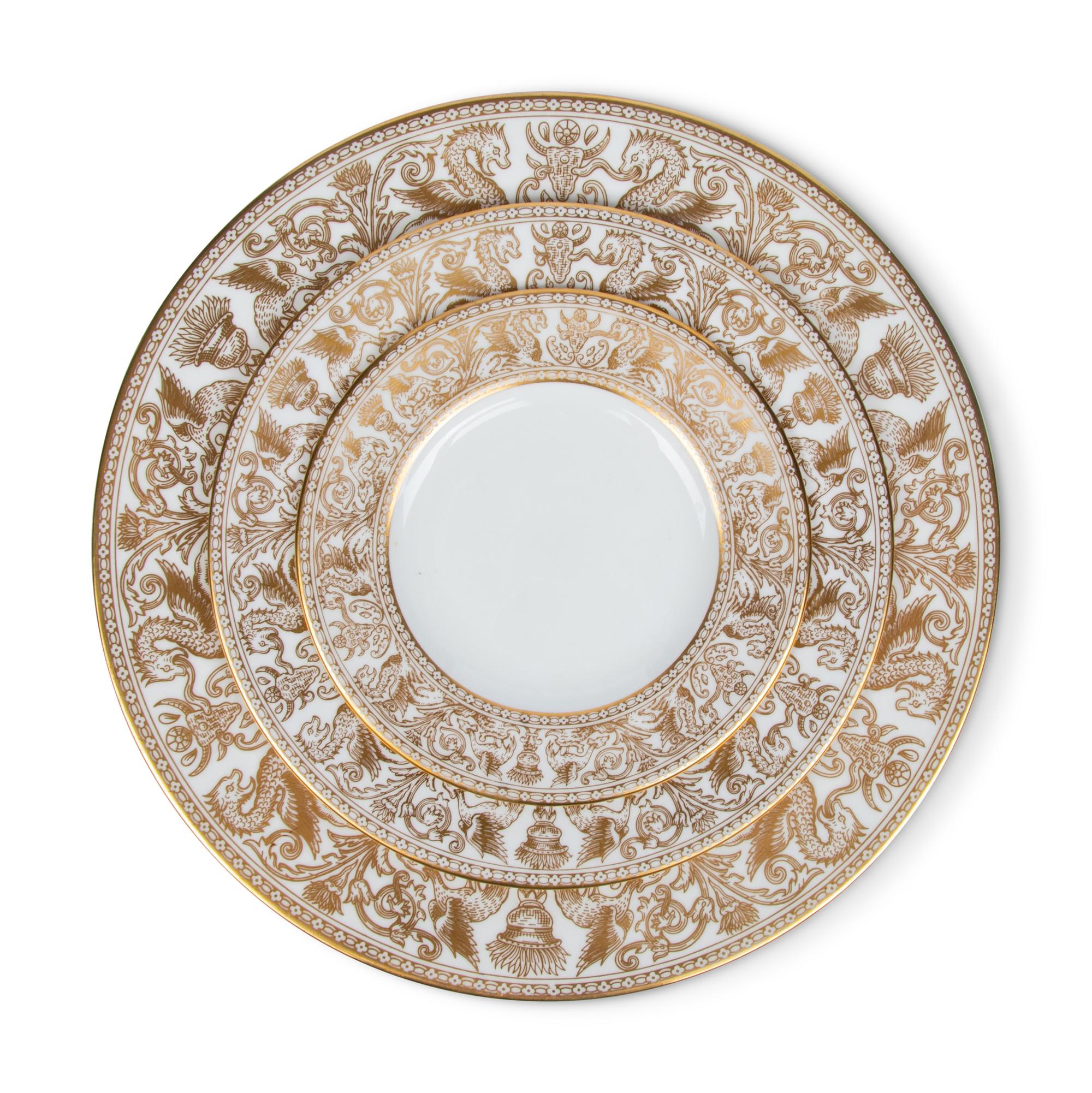 A Wedgwood Gold Florentine Porcelain Dinner Service