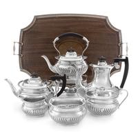 An English Silver Seven-Piece Tea and Coffee Service, Edward Viners Ltd., Sheffield, 1947, each having a demi-fluted body, comprising a