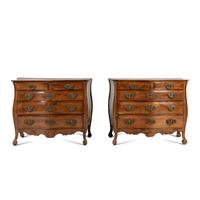 A Pair of Continental Walnut Chests of Drawers
