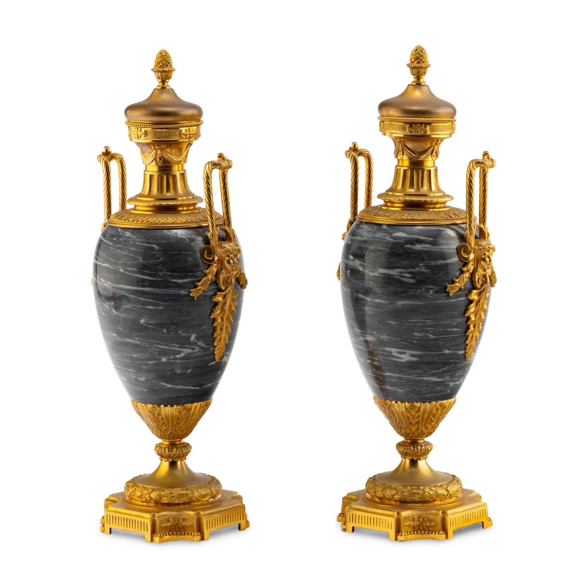 A Pair of Louis XVI Style Gilt Bronze Mounted Marble Urns