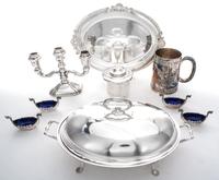 A Collection of Silver-plate Table Articles, , comprising four salts in the form of viking ships, a center bowl, a three-light candelab