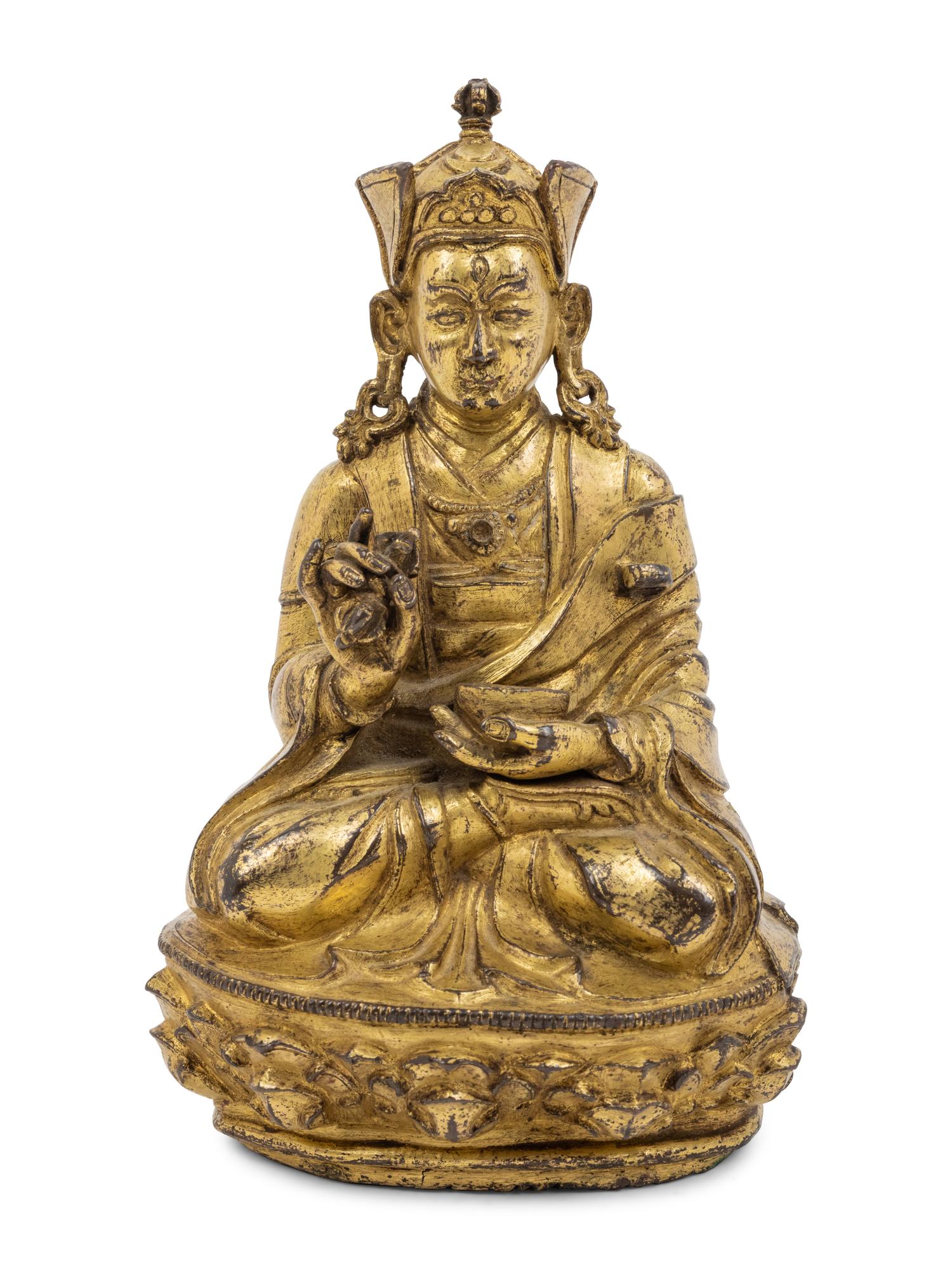 A Tibetan Gilt Bronze Figure of a Seated Karmapa
