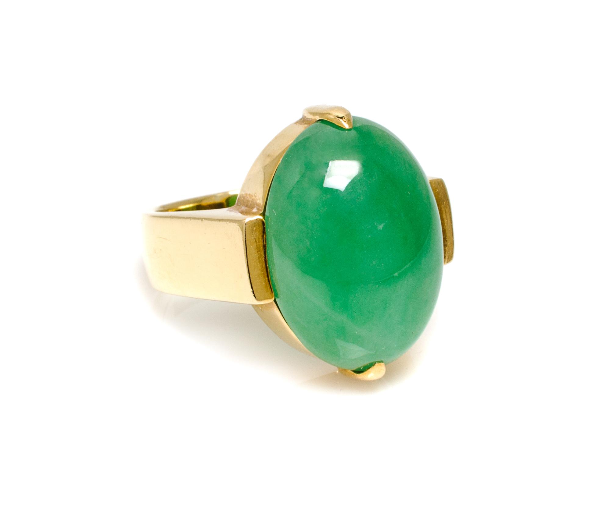 An 18 Karat Yellow Gold and Jadeite Ring, Gump's, 11.00 dwts.