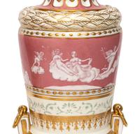 A Pair of Porcelain Urns
