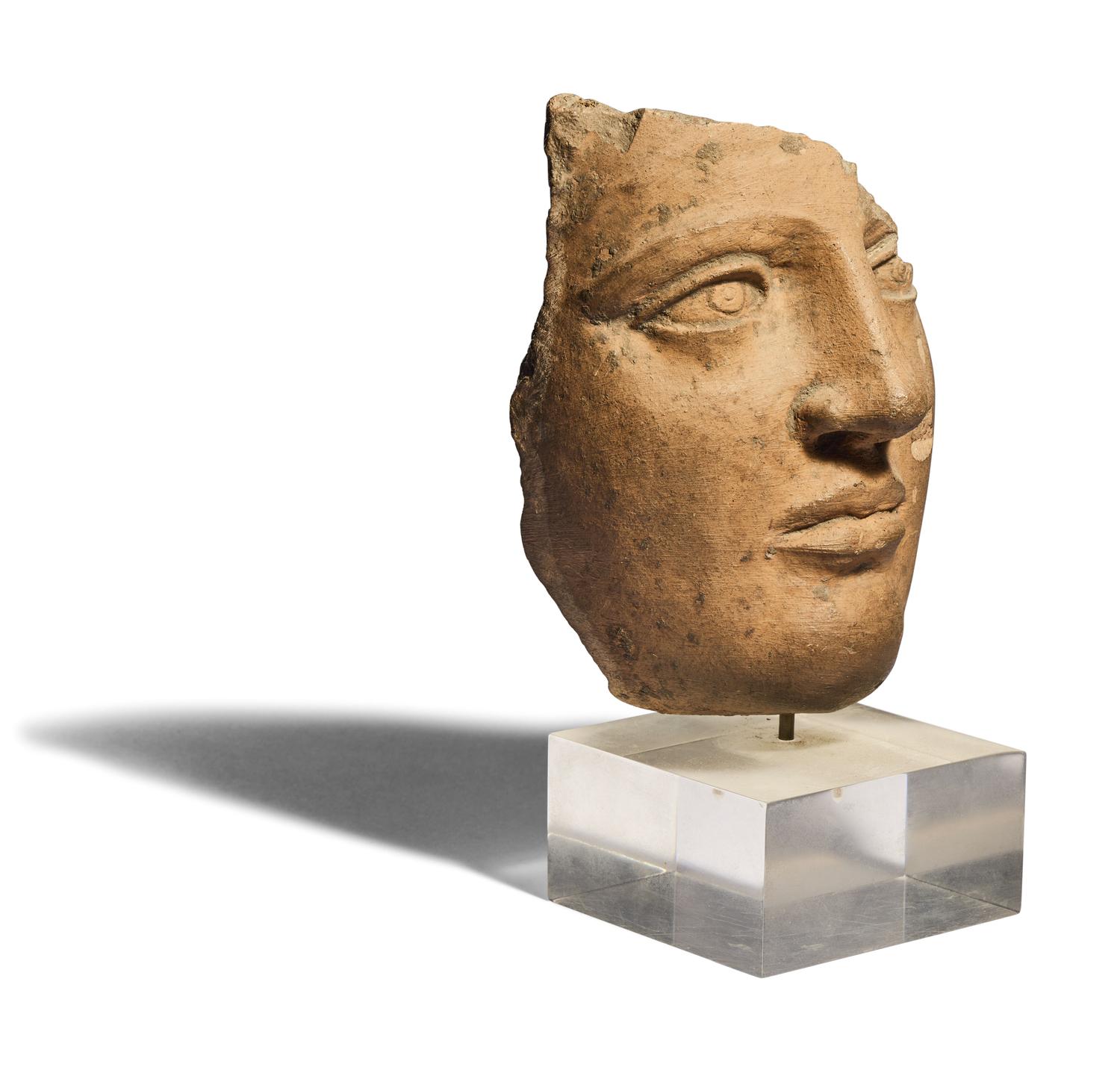An Etruscan Terracotta Face Fragment