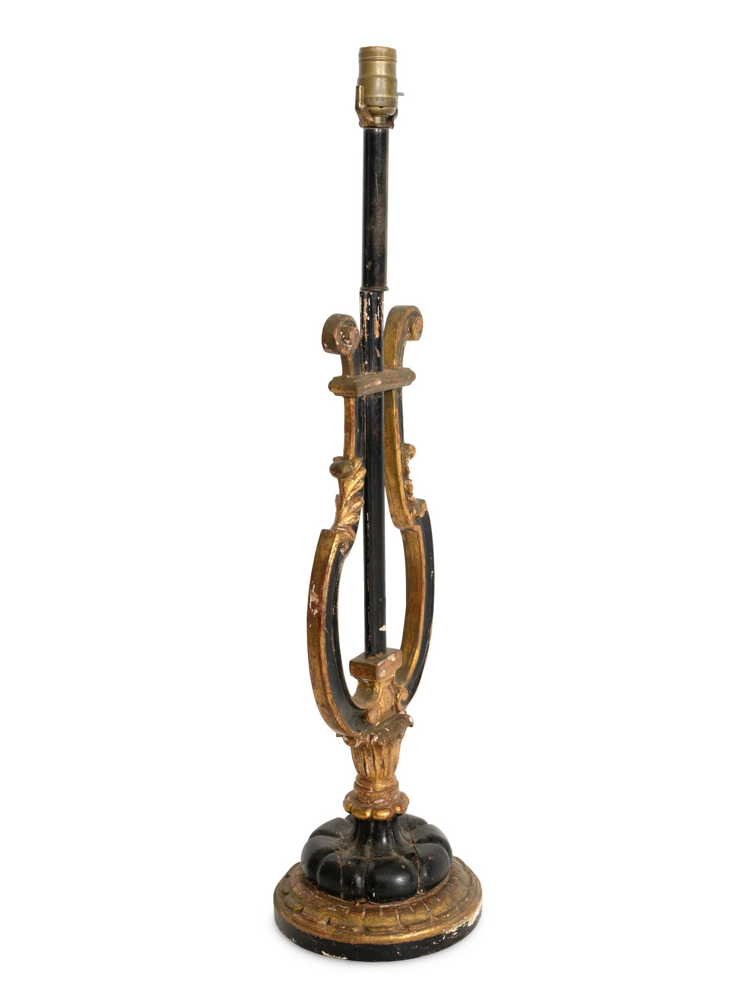 A Italian Ebonized Giltwood Harp-Form Lamp