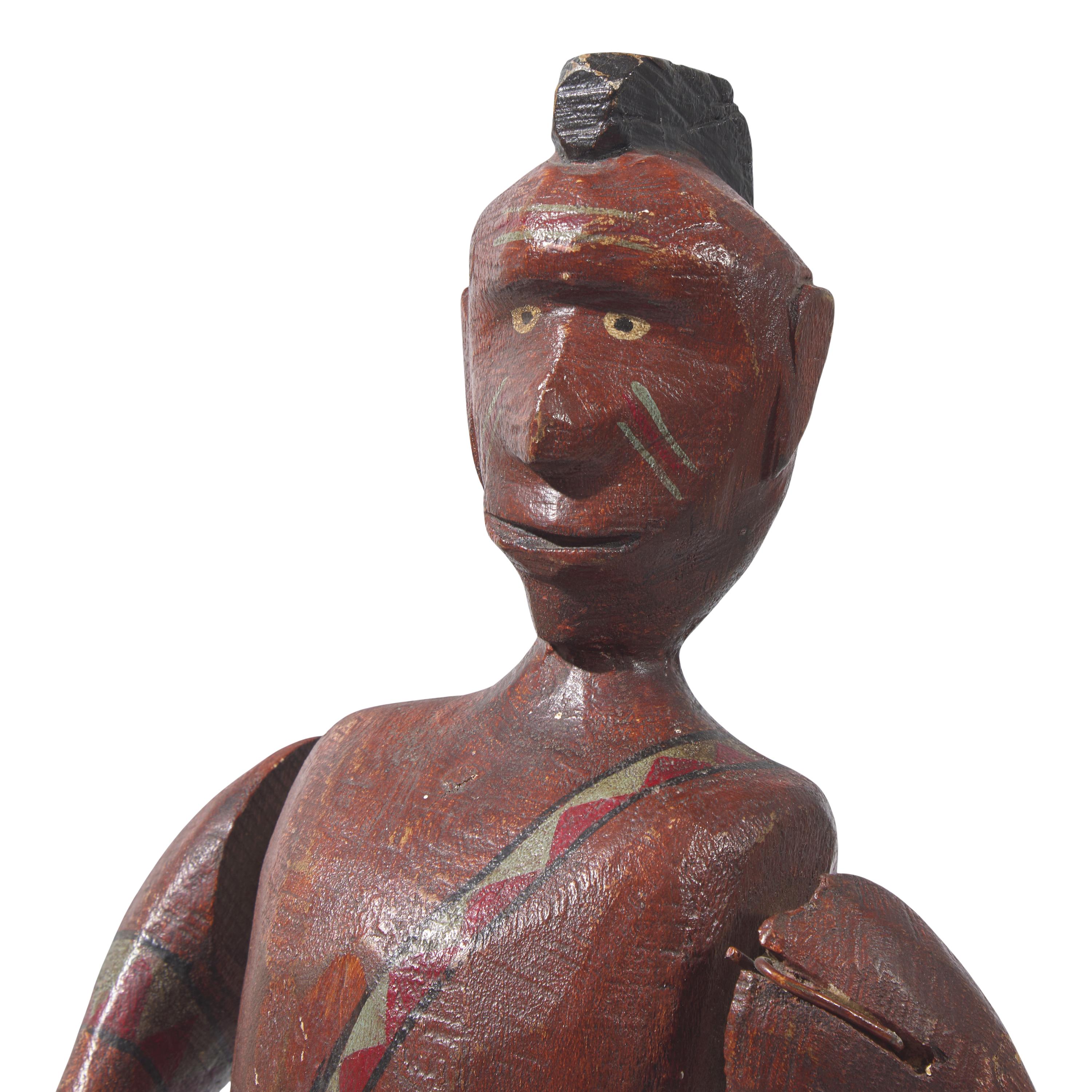 A Carved and Painted Wood Whirligig of a Native American Figure