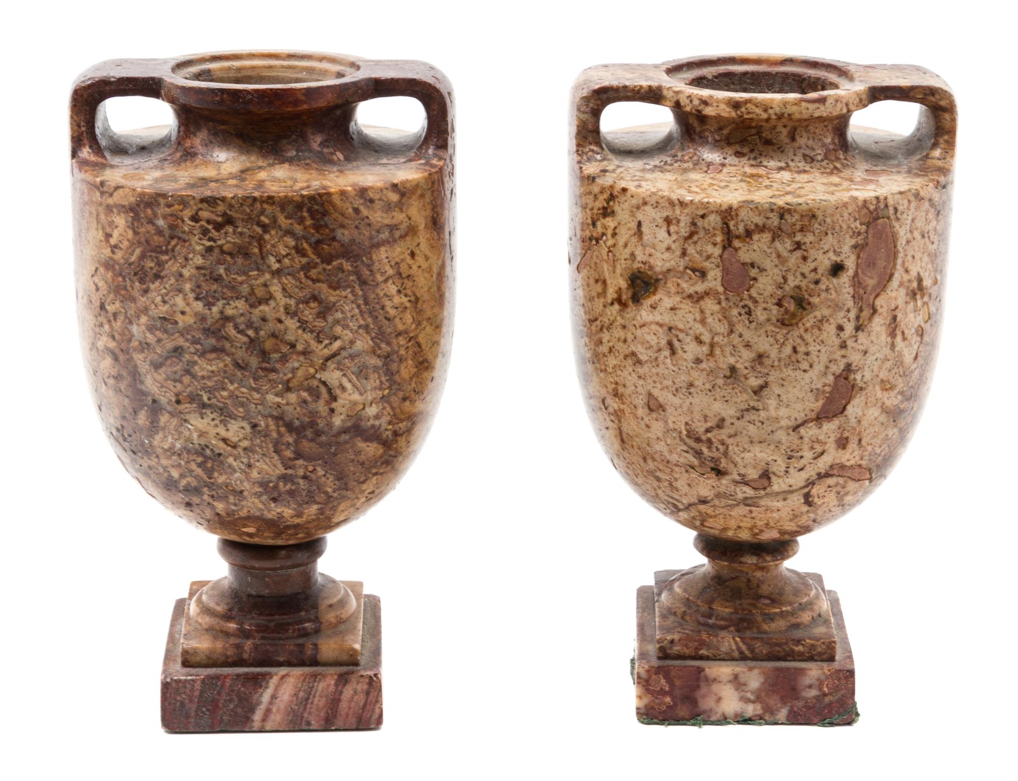 A Pair of Continental Marble Urns Height 8 inches.