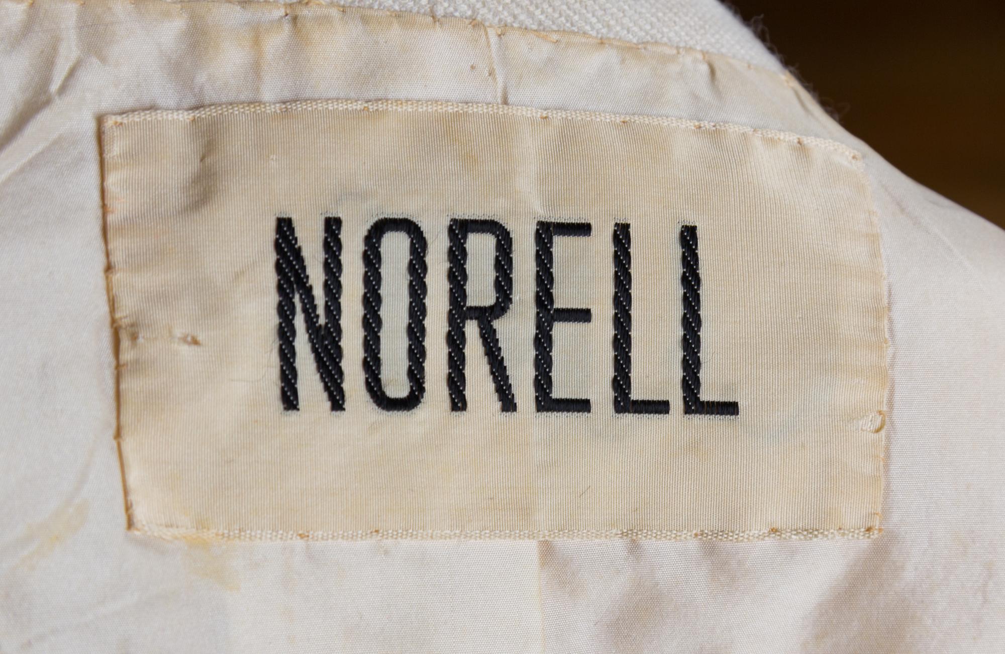 A Norell Red and White Wool Windowpane Double Breasted Coat, No size.