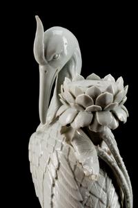 A Pair of Chinese Blanc de Chine Porcelain Crane-Form Candlesticks