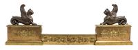 An Empire Style Gilt and Patinated Bronze Fire Guard Height 31 3/4 x width 27 1/4 inches.