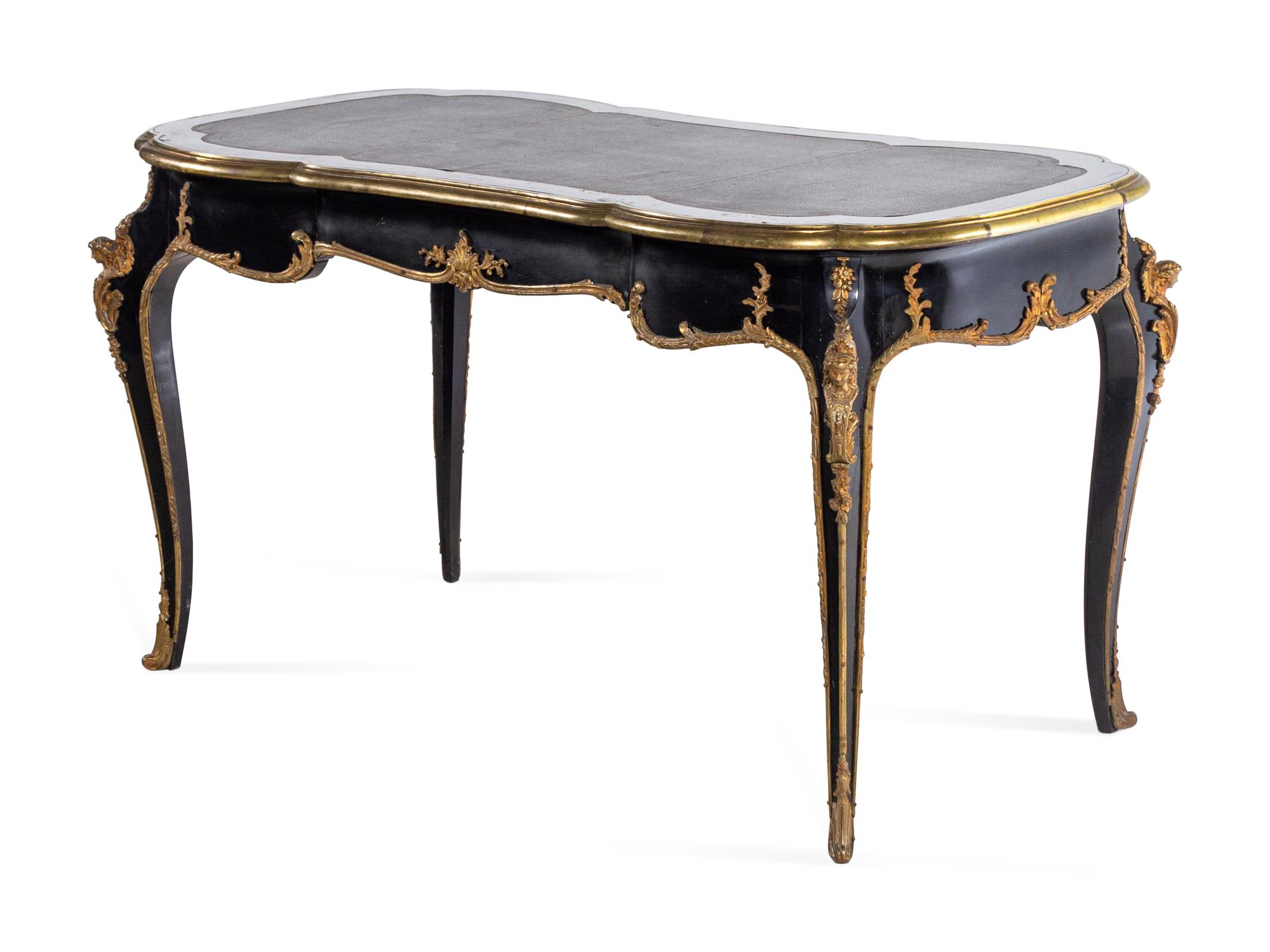 A Louis XV Style Gilt Bronze Mounted Ebonized Bureau Plat