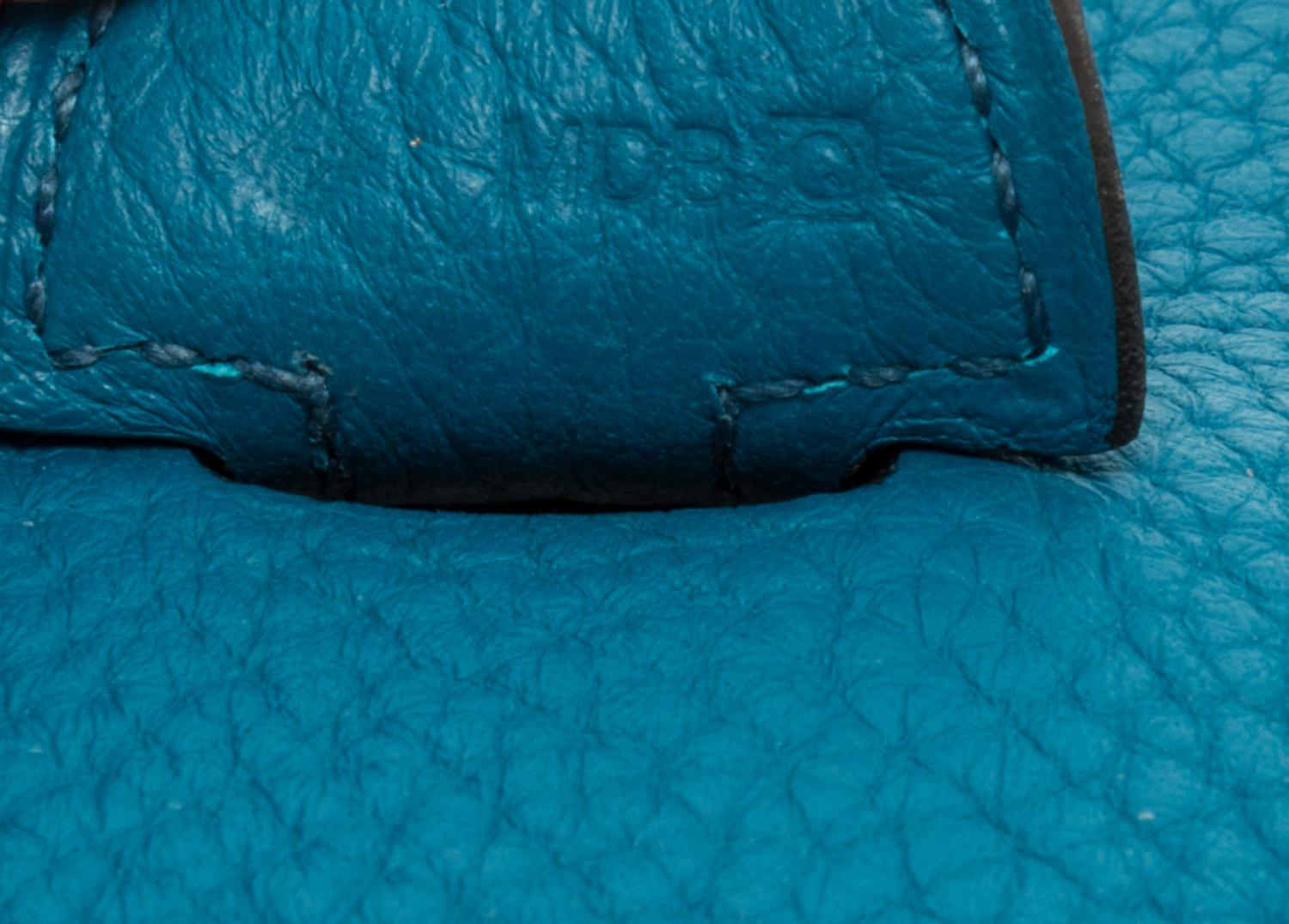 An Hermes Bleu Izmir Taurillon Clemence Evelyne III PM Handbag, 11.25" x 12" x 2.5".