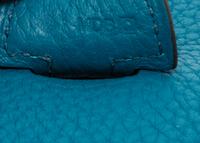 An Hermes Bleu Izmir Taurillon Clemence Evelyne III PM Handbag, 11.25" x 12" x 2.5".
