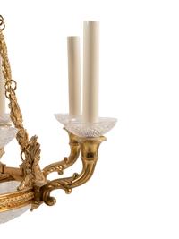 An Empire Style Gilt Metal and Cut Glass Eight-Light Chandelier