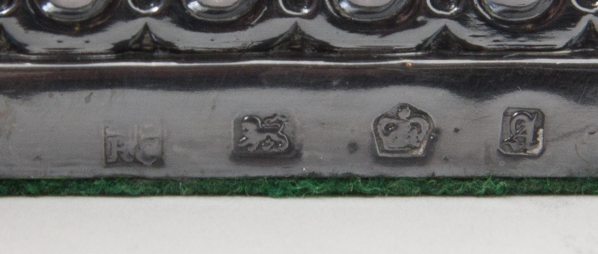 A Pair of George III Silver Candelabra, Fenton Creswick & Co., Sheffield, 1779, each stem in the form of addorsed columns raised on a s