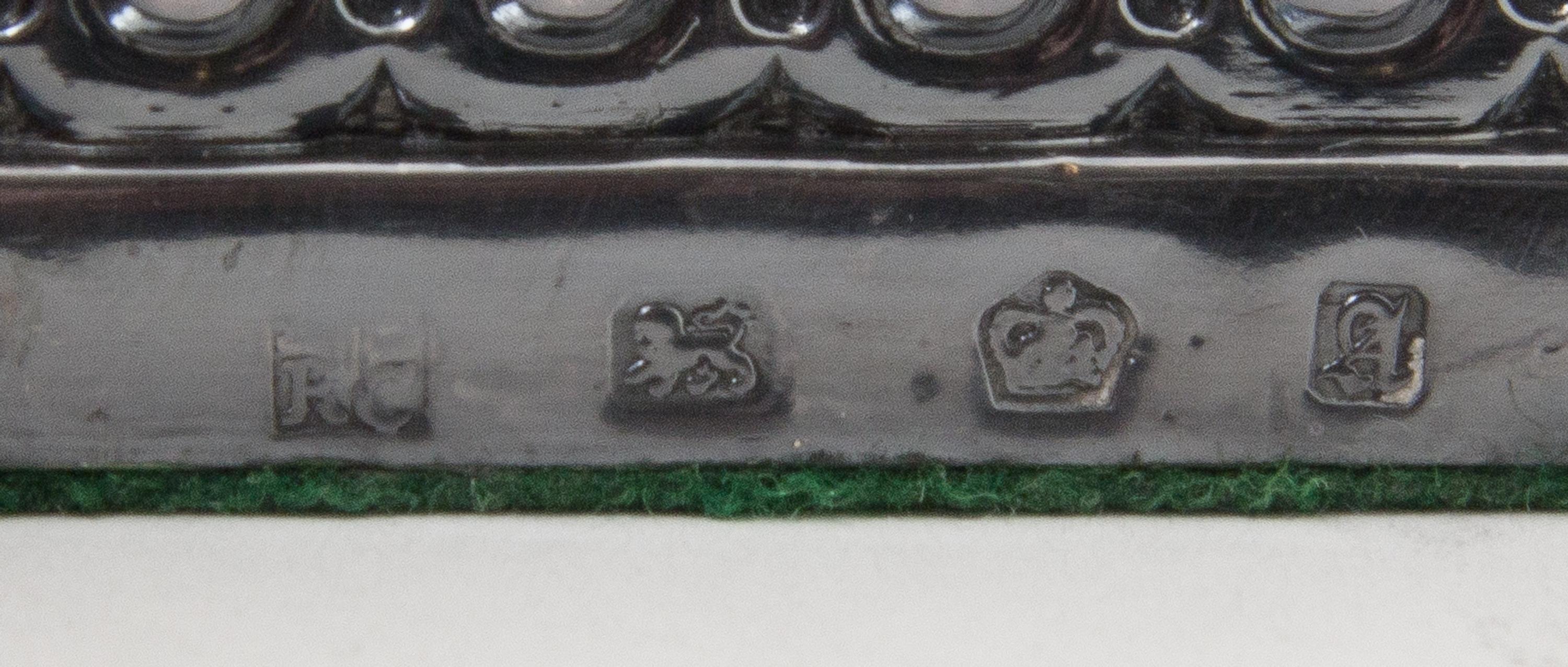 A Pair of George III Silver Candelabra, Fenton Creswick & Co., Sheffield, 1779, each stem in the form of addorsed columns raised on a s