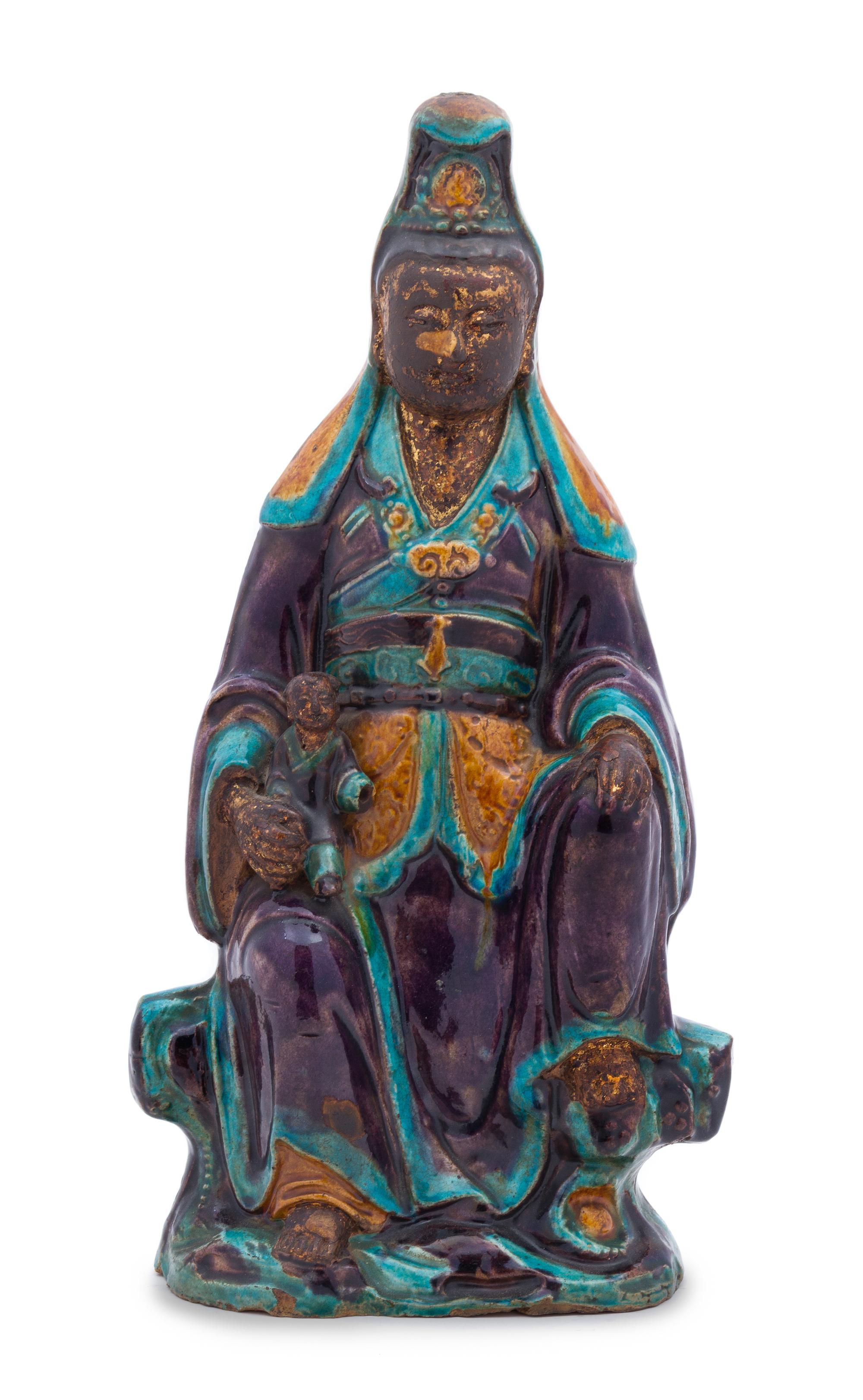 A Chinese Fahua Stoneware Figure of Avalokitesvara MING DYNASTY Height 16 1/4 inches. — MING DYNASTY
