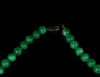 A Jadeite Bead Necklace and Bangle