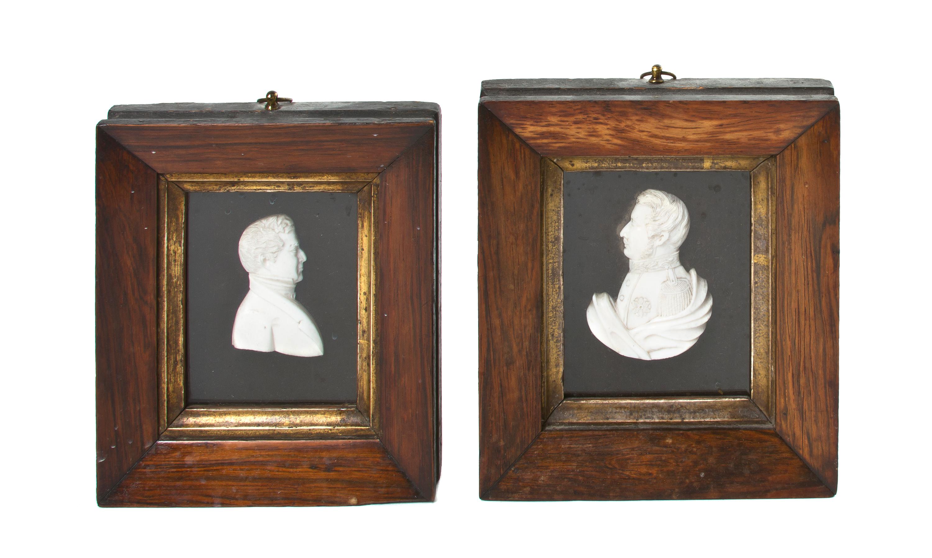 A Pair of Carved Ivory Profiles, Height overall 6 1/4 inches.