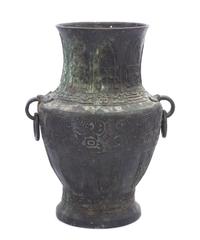 A Chinese Archaistic Bronze Vase 18TH/19TH CENTURY Height 17 1/8 inches. — 18TH/19TH CENTURY