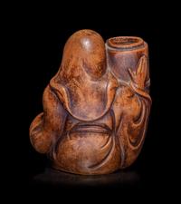 A Japanese Bronze Figure of a Seated Immortal