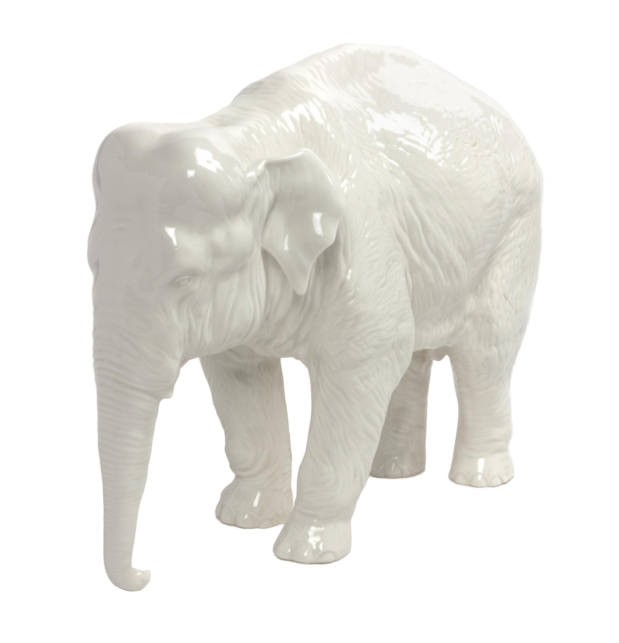 A Nymphenburg Porcelain Elephant Width 11 1/2 inches. — 20TH CENTURY