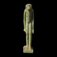 An Egyptian Green Faience Baboon Amulet