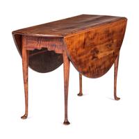 A Queen Anne Tiger Maple Pad-Foot Drop-Leaf Table