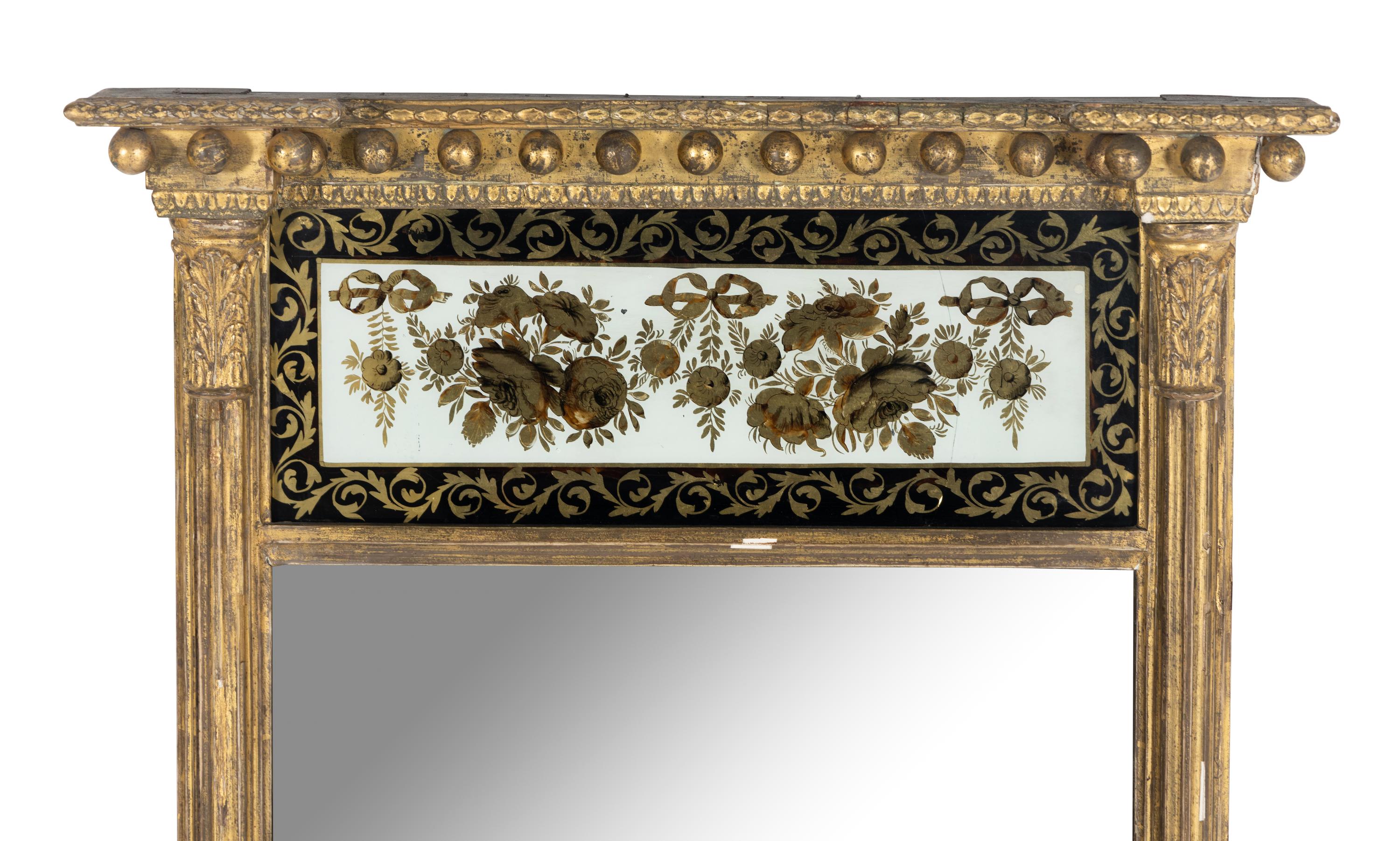 A Regency Giltwood and Églomisé Mirror