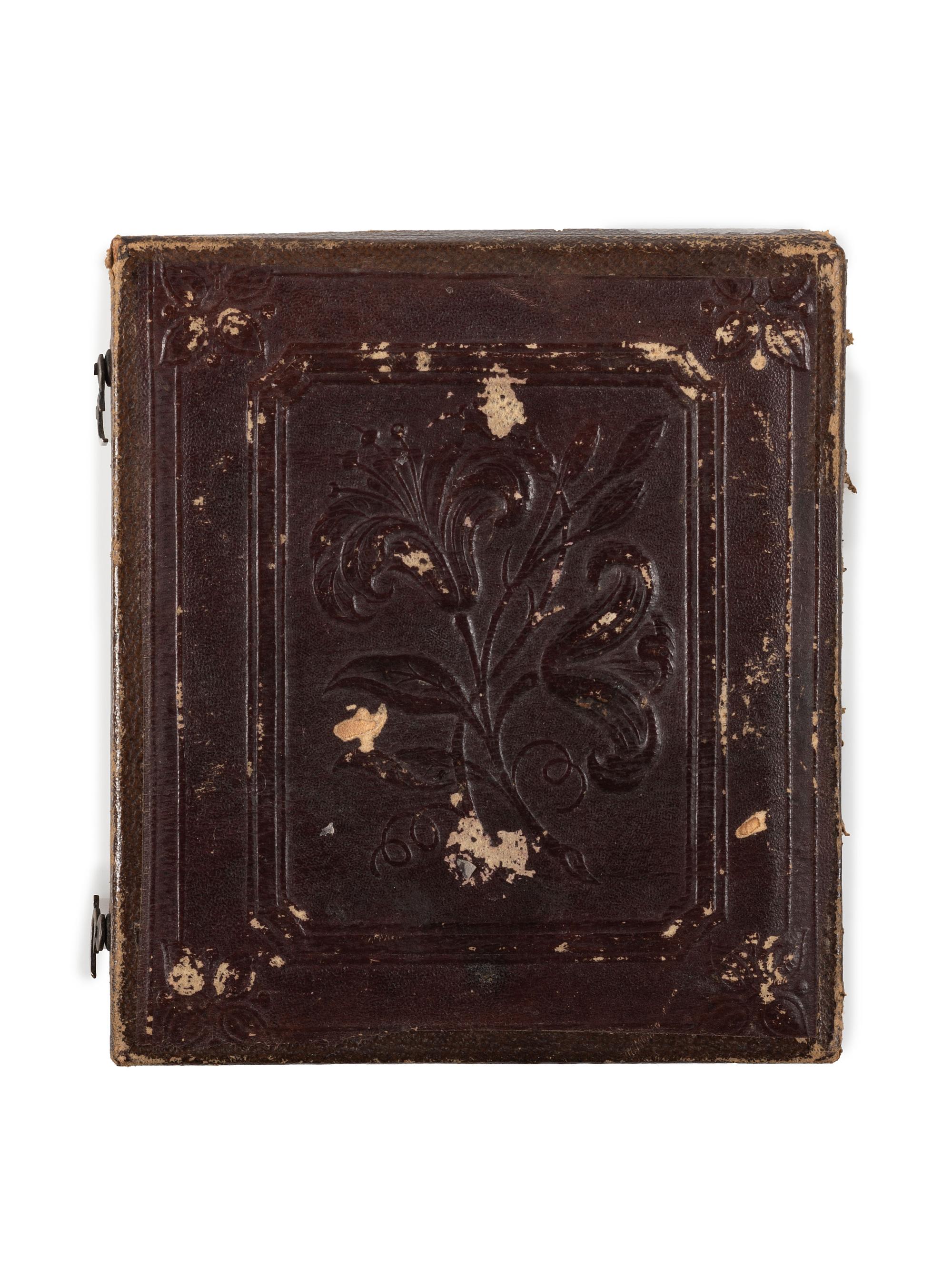 [EARLY PHOTOGRAPHY]. A pair of daguerreotypes of folk art painted portraits, comprising: