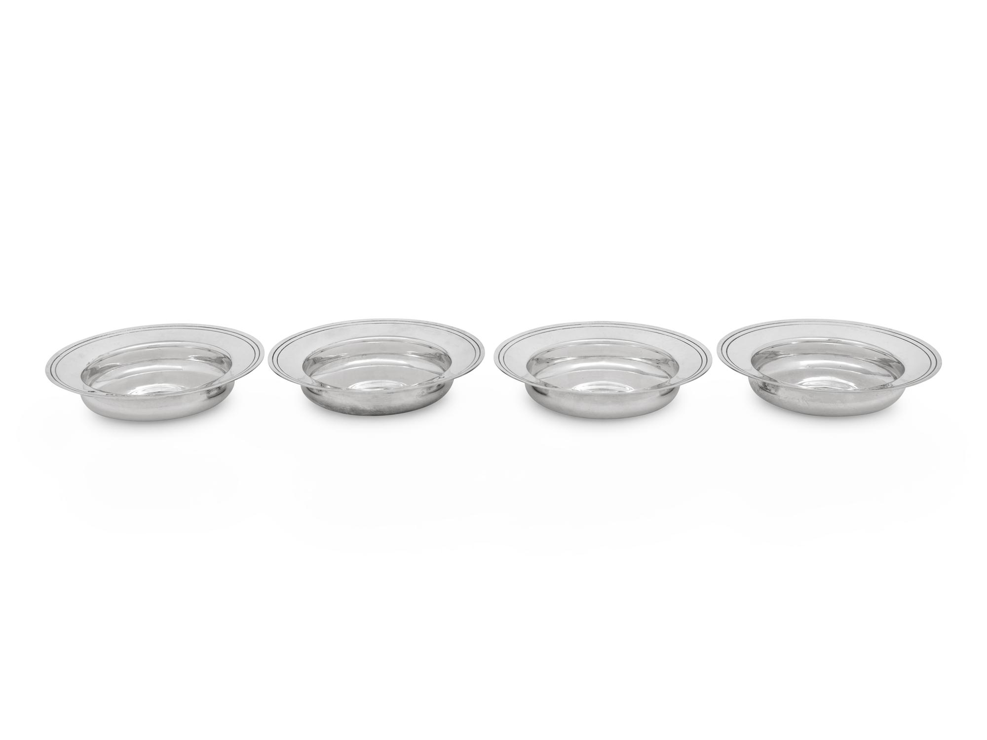 A Set of Four English Silver Ash Receivers