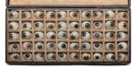 A Cased Set of Fifty Colored Glass Prosthetic Eyes