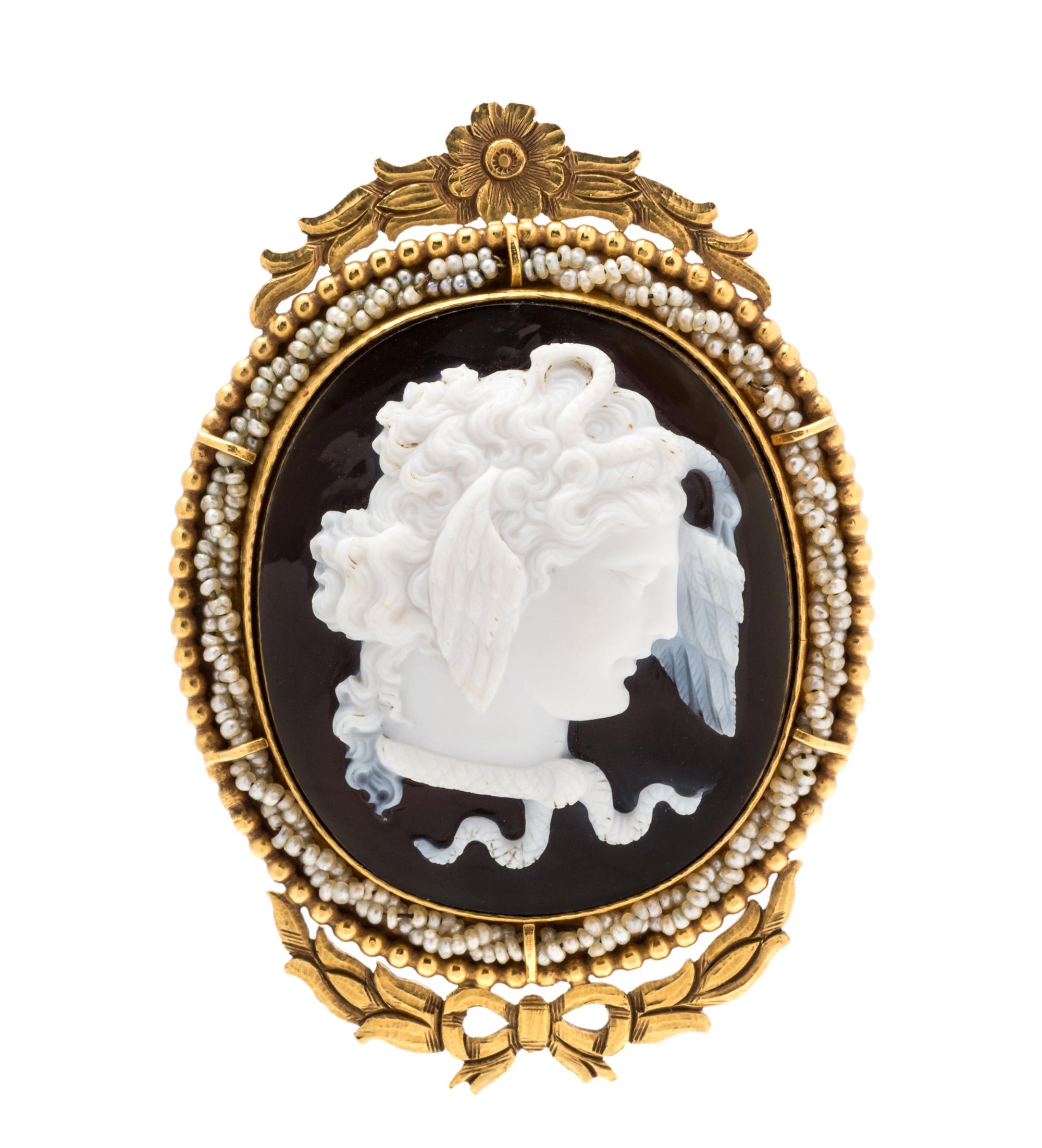 A Victorian Yellow Gold, Carved Onyx Cameo and Seed Pearl Brooch, 16.50 dwts.