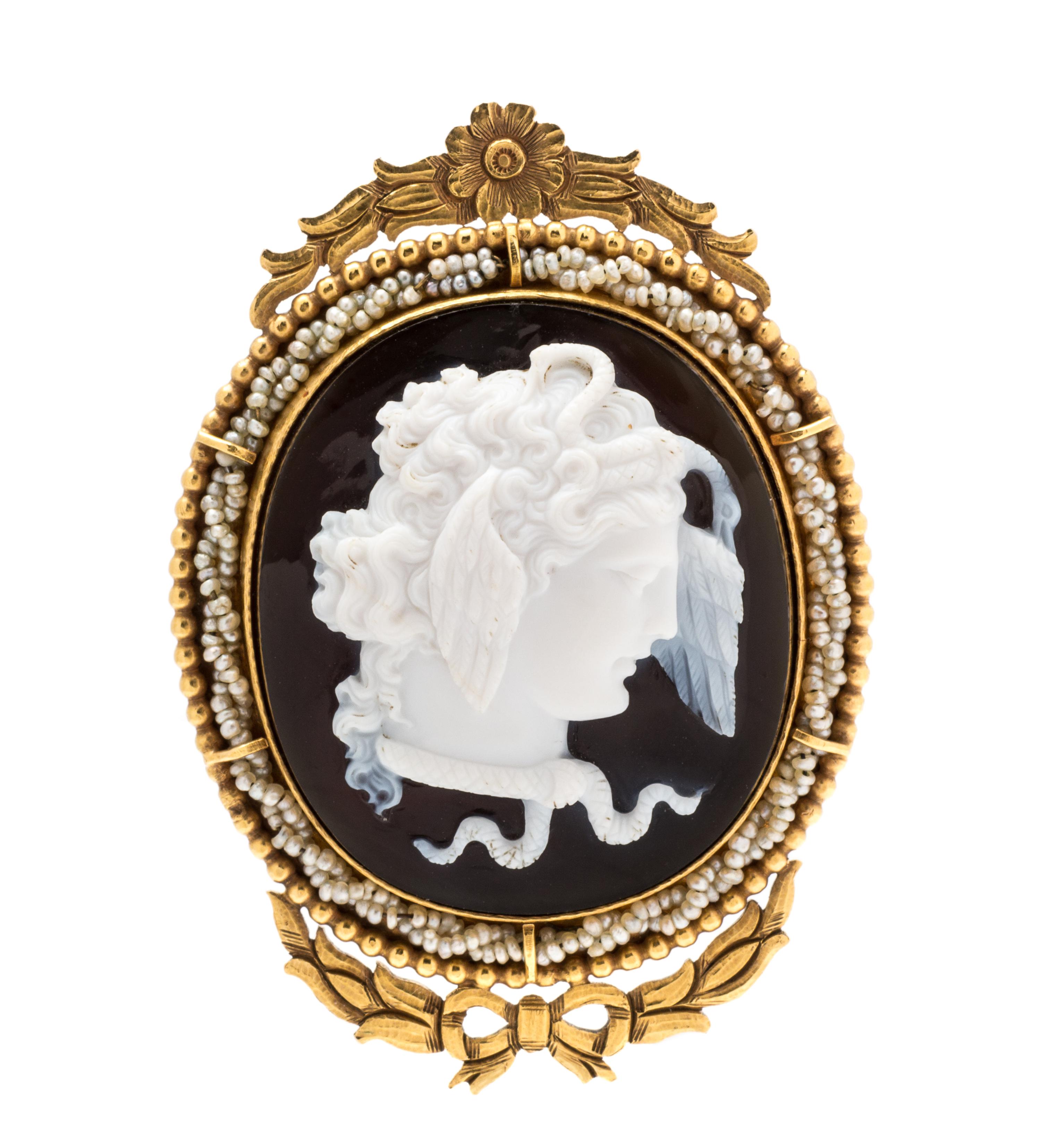 A Victorian Yellow Gold, Carved Onyx Cameo and Seed Pearl Brooch, 16.50 dwts.