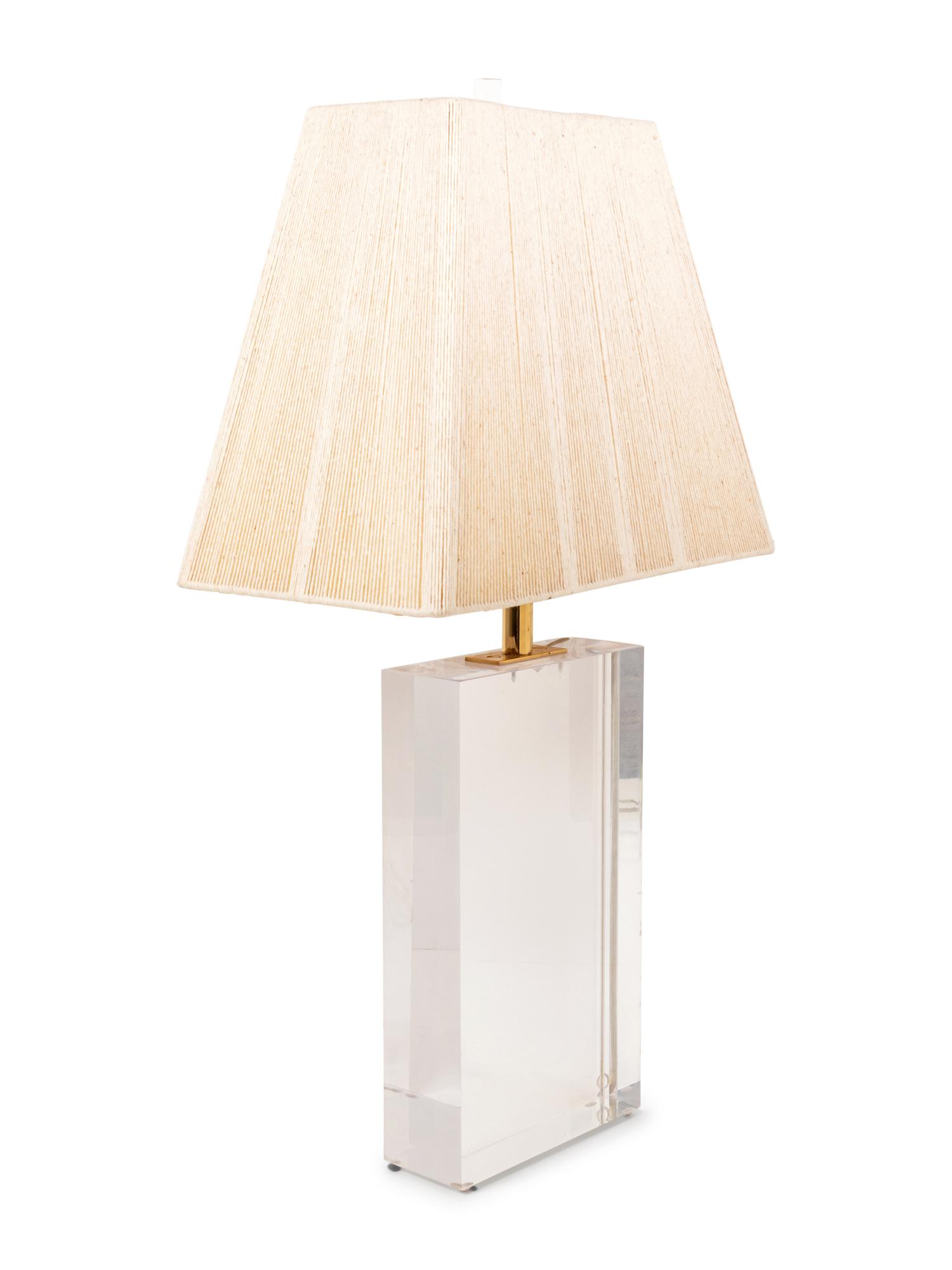 A Lucite Table Lamp with a Pleated Shade
