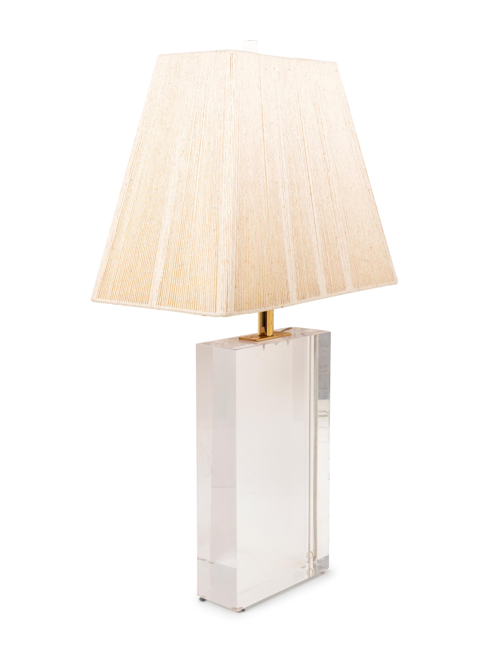 A Lucite Table Lamp with a Pleated Shade