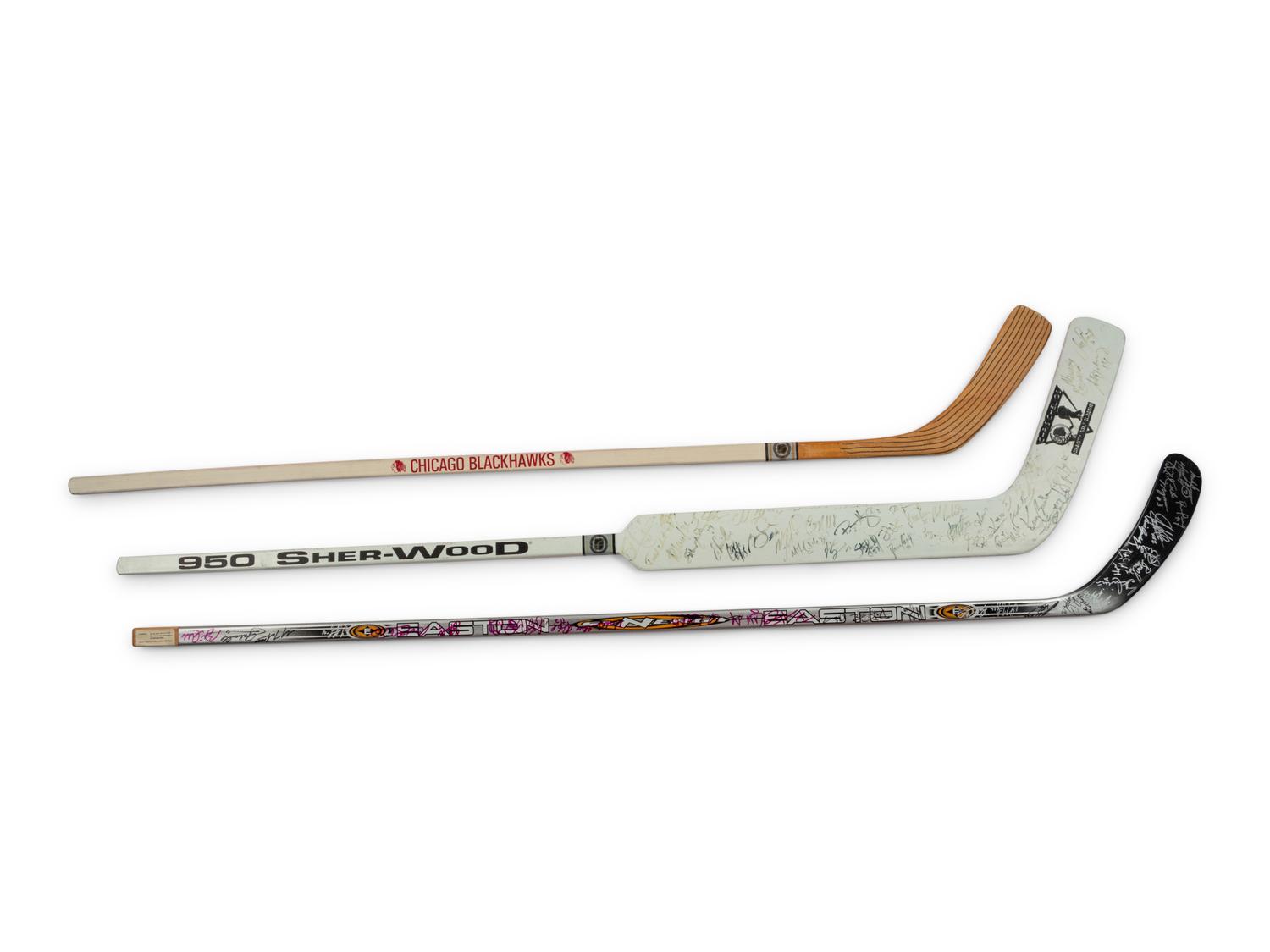 A Group of Chris Chelios Charity Golf Outing Multi Signed Autograph Hockey Sticks