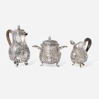 A miniature Continental silver repoussé three-piece coffee service, probably 19th century