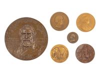 A Group of Five Bronze Medallions and a Bronze Plaque