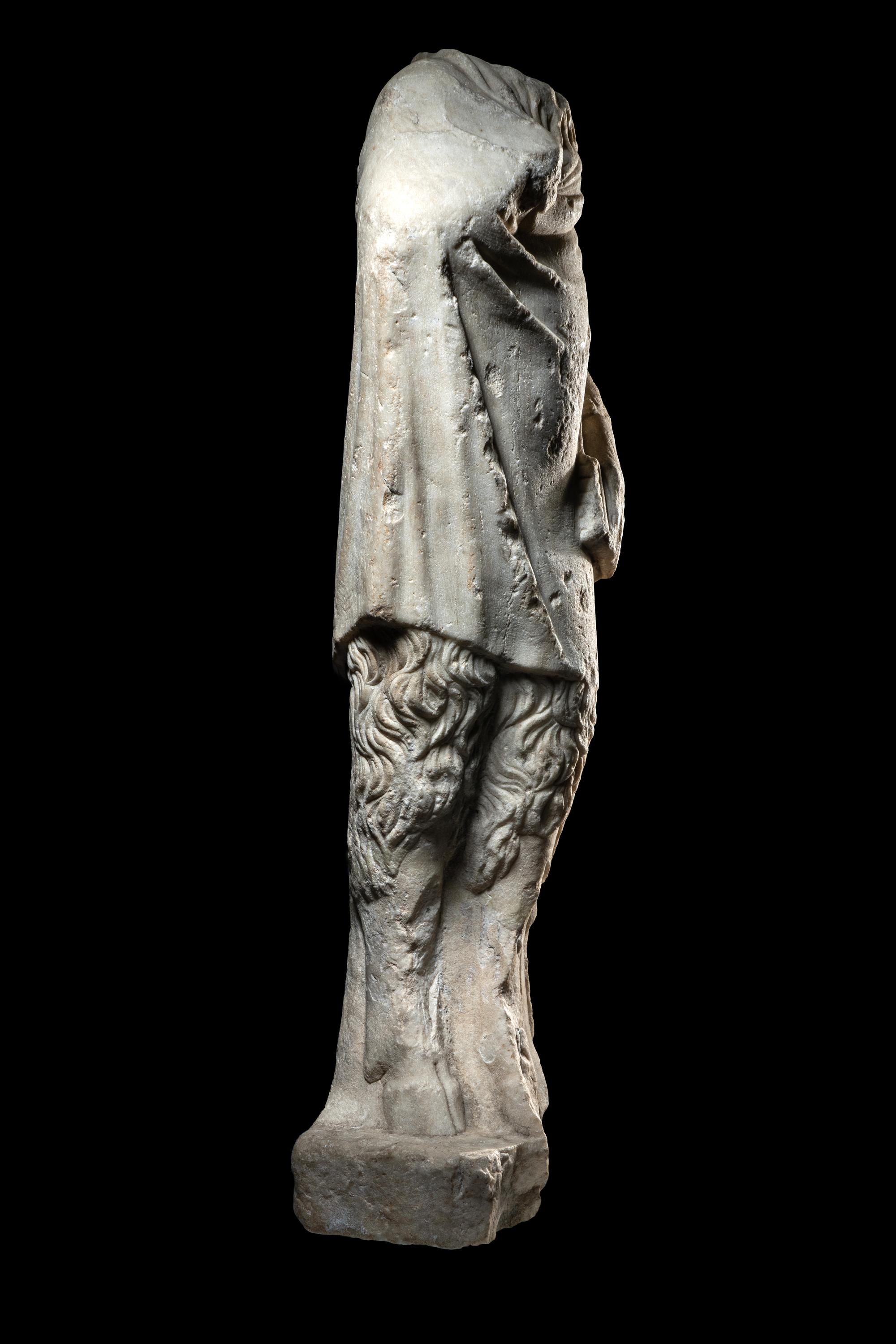 A Roman Marble Statue of Pan Holding Pipes