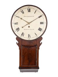 A Regency Figured Mahogany Wall Clock