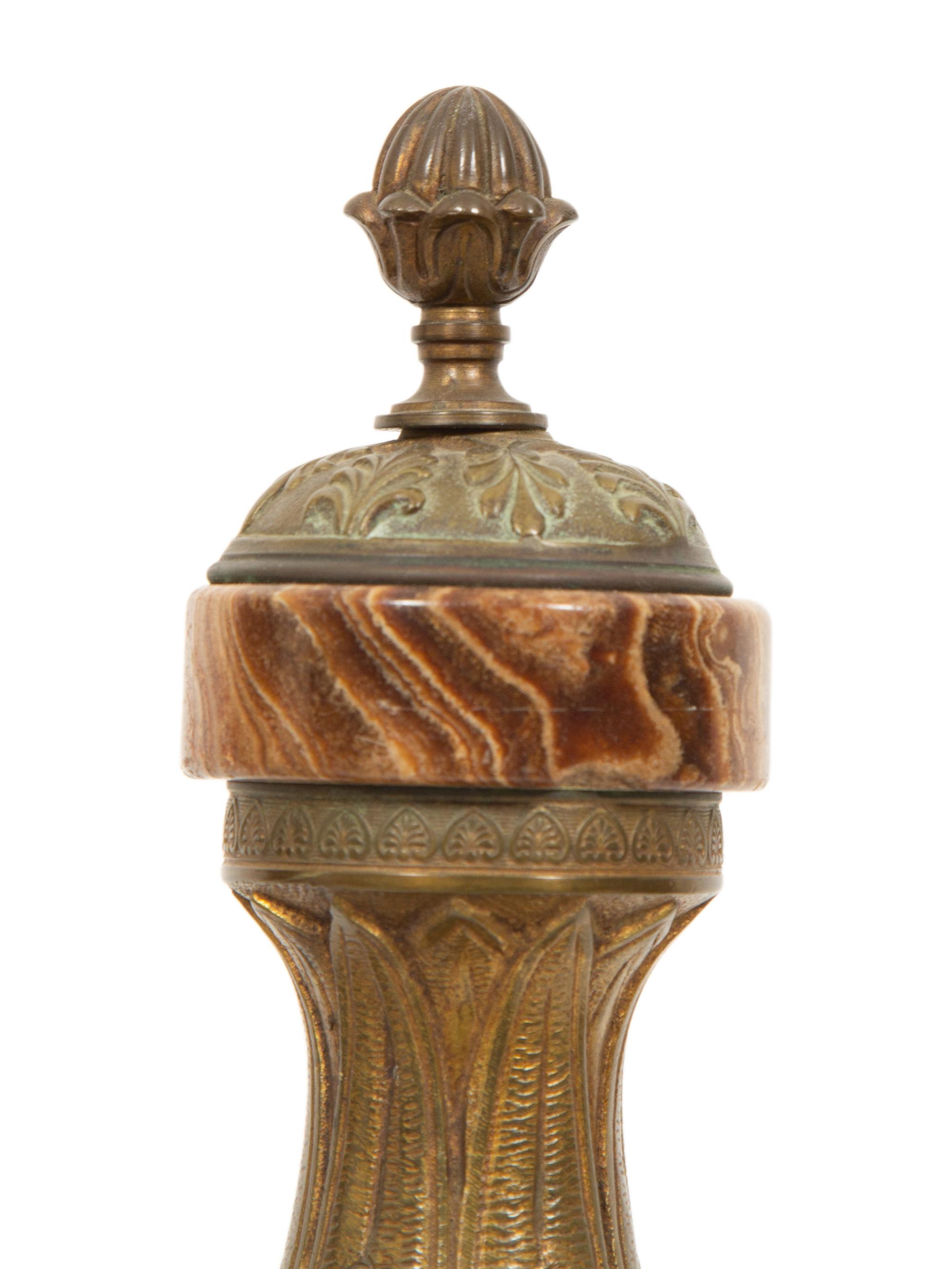 A Pair of Continental Gilt Bronze and Onyx Urns