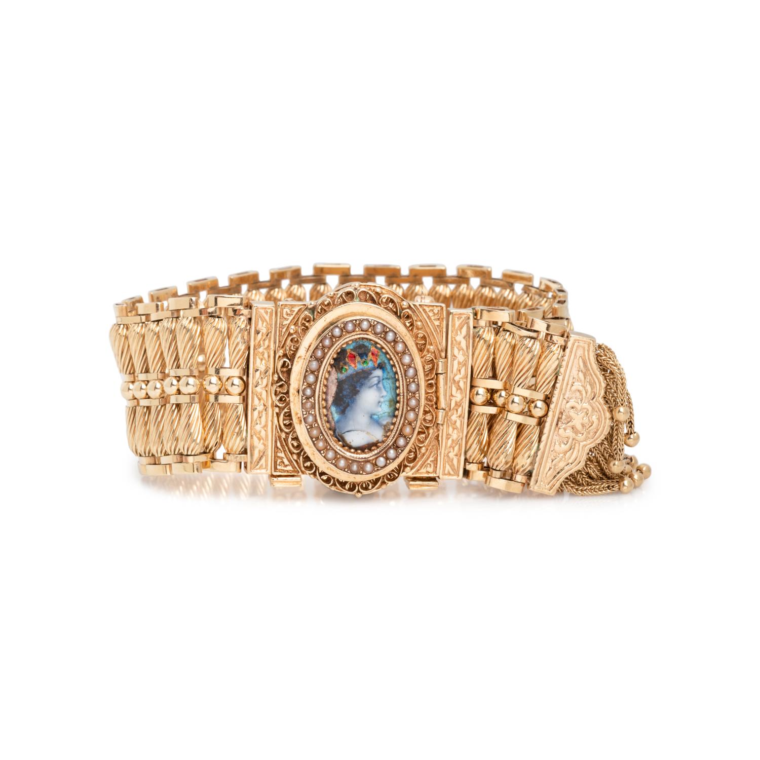 CONVERTIBLE YELLOW GOLD, ENAMEL AND SEED PEARL SURPRISE WRISTWATCH/PENDANT/BROOCH